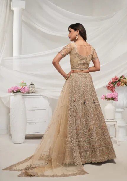 golden color sequins stone work soft net bridal lehenga choli