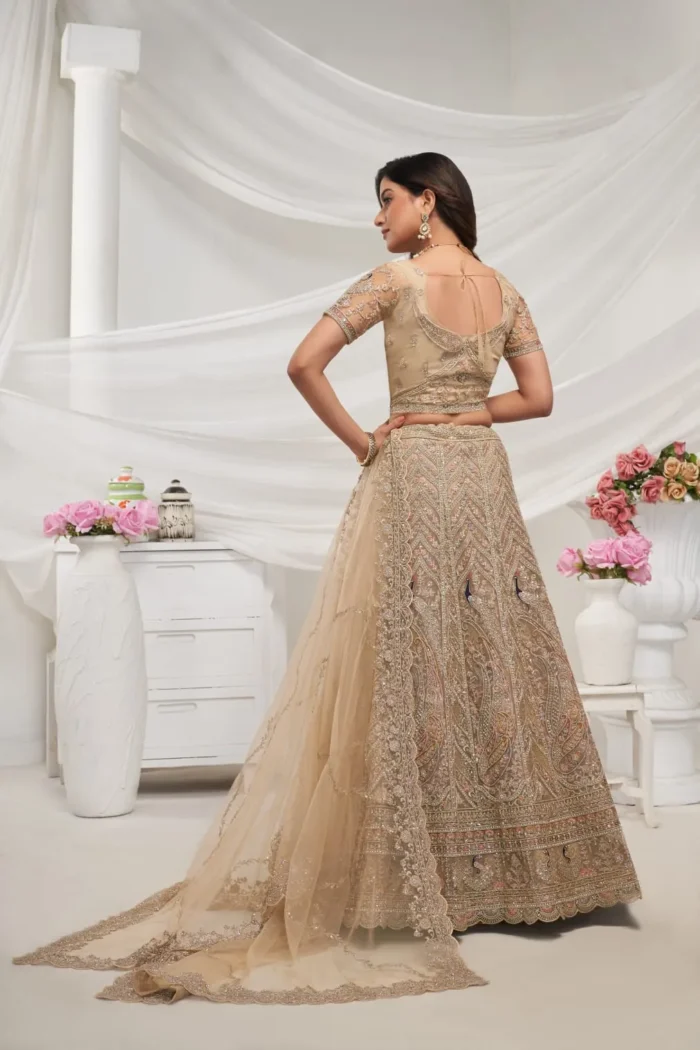 golden color sequins stone work soft net bridal lehenga choli