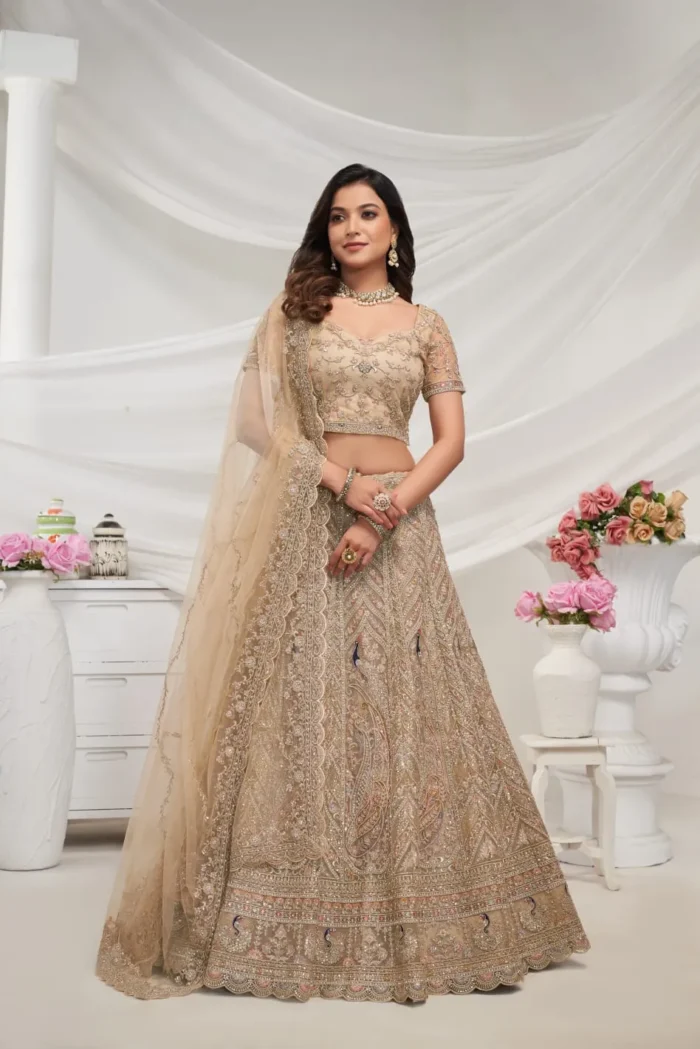 golden color sequins stone work soft net bridal lehenga choli