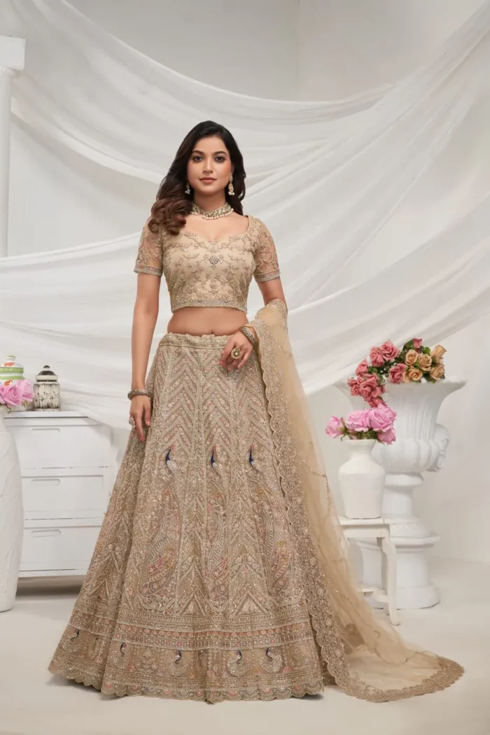 golden color sequins stone work soft net bridal lehenga choli