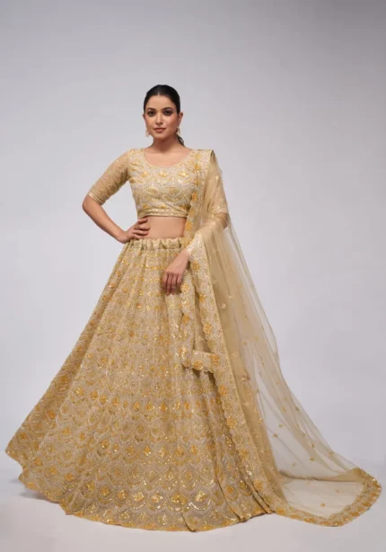 golden color leaves pattern sequins embroidered soft net bridal lehenga choli