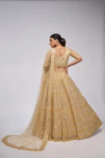 golden color leaves pattern sequins embroidered soft net bridal lehenga choli