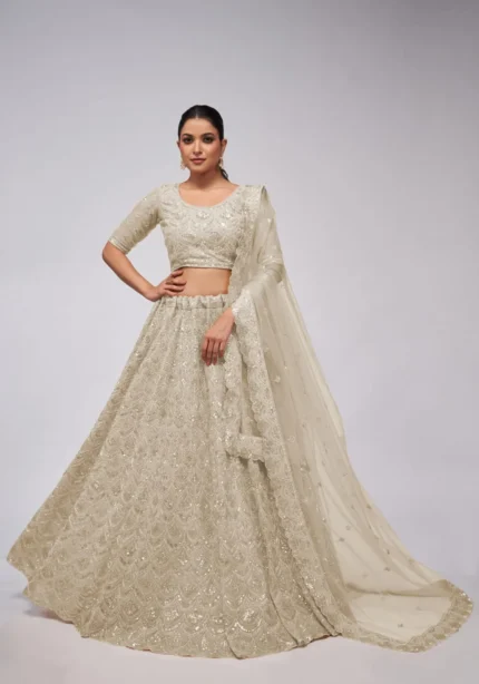 white ivory color leaves pattern sequins embroidered soft net bridal lehenga choli