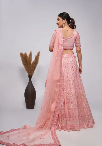 Pink color soft net sequins embroidered bridal lehenga choli