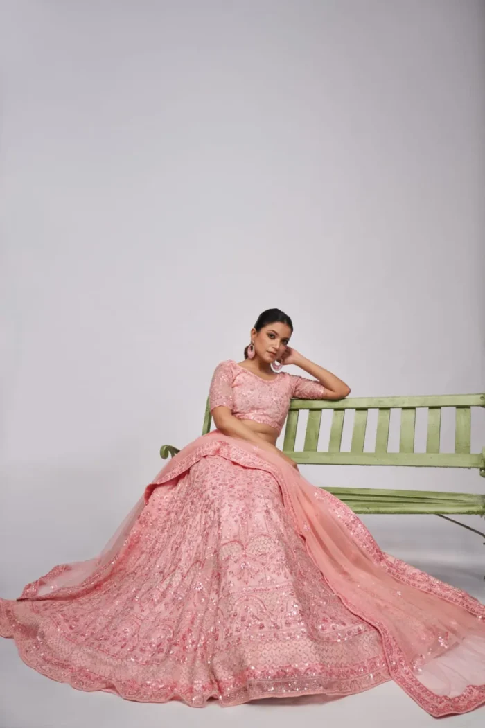 Pink color soft net sequins embroidered bridal lehenga choli