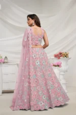 mauve pink color soft net fabric multi color thread radiant mirror and sequence work embroidered bridal lehenga choli