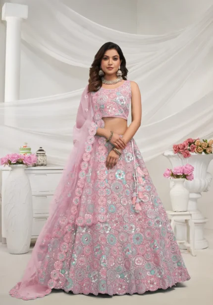 mauve pink color soft net fabric multi color thread radiant mirror and sequence work embroidered bridal lehenga choli