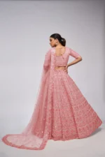 pink color leaves pattern sequins embroidered soft net bridal lehenga choli