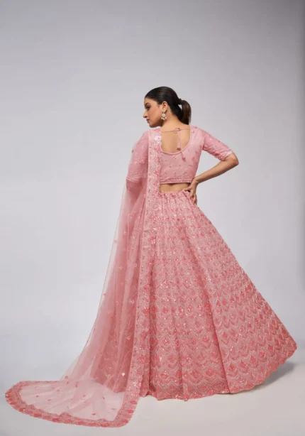 pink color leaves pattern sequins embroidered soft net bridal lehenga choli