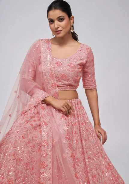 pink color leaves pattern sequins embroidered soft net bridal lehenga choli