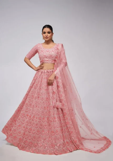 pink color leaves pattern sequins embroidered soft net bridal lehenga choli