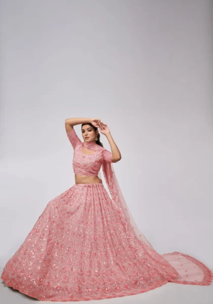 pink color leaves pattern sequins embroidered soft net bridal lehenga choli