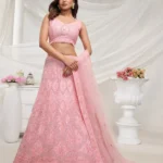 pink rhinestones zari sequins work soft net fabric bridal lehenga choli