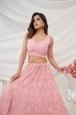 pink rhinestones zari sequins work soft net fabric bridal lehenga choli