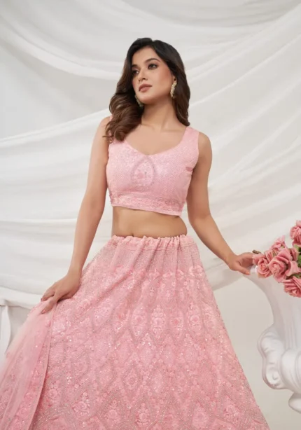 pink rhinestones zari sequins work soft net fabric bridal lehenga choli