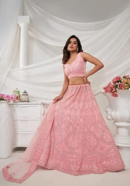 pink rhinestones zari sequins work soft net fabric bridal lehenga choli