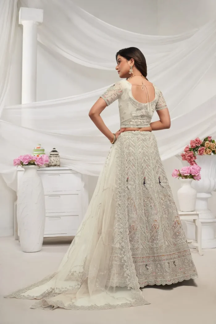 Ivory White color sequins stone work soft net bridal lehenga choli