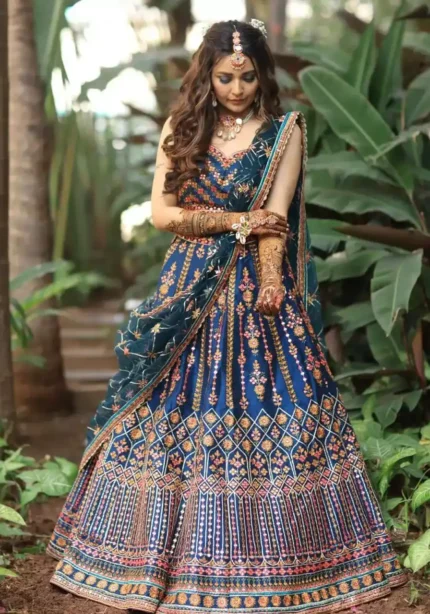 blue chinnon fabric multi color thread work bridal and party wear lehenga choli