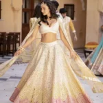cream color faux georgette fabric embroidered party wear lehenga choli