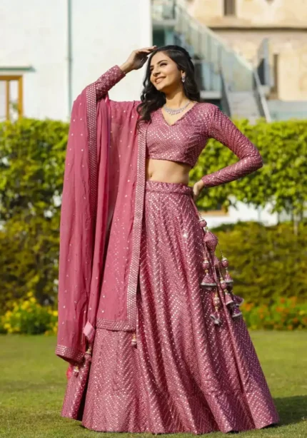 faux georgette fabric metalic pink color embroidered party wear lehenga choli