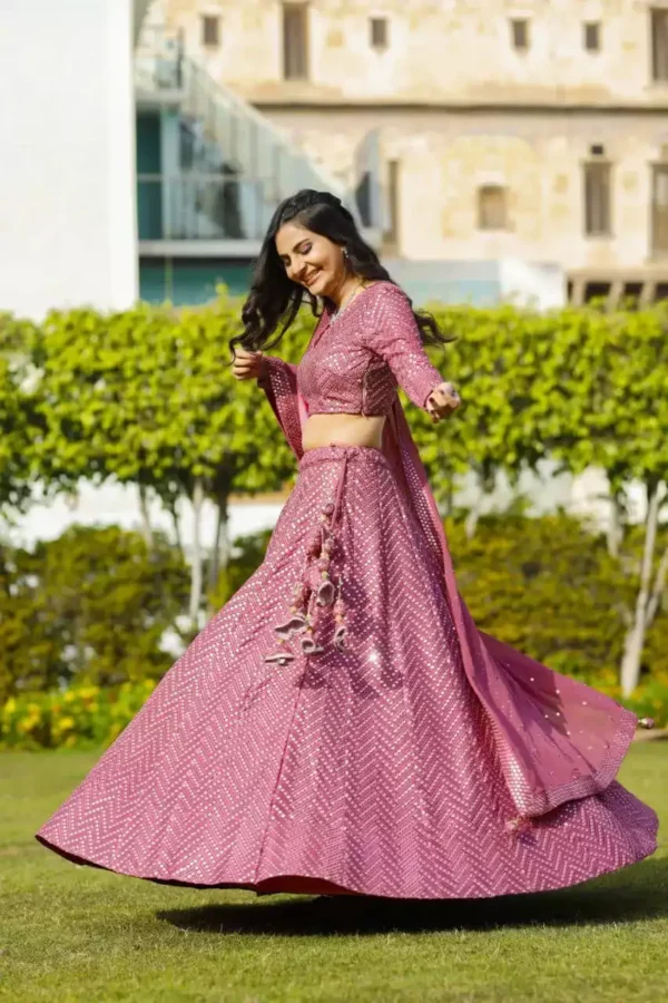 faux georgette fabric metalic pink color embroidered party wear lehenga choli