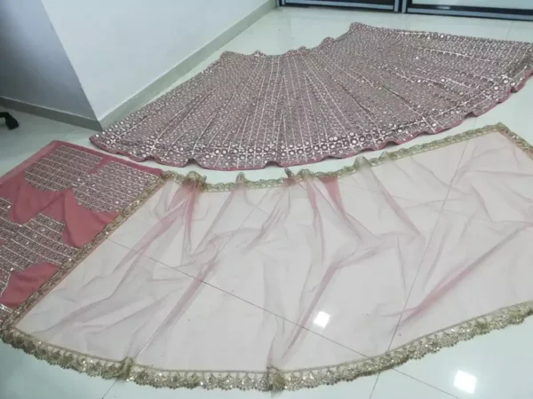 peach color faux georgette fabric embroidered party wear lehenga choli