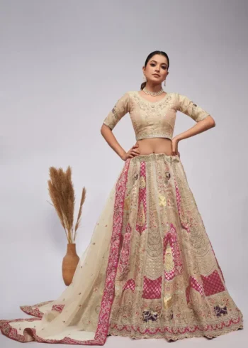 ivory color organza silk fabric paisley motifs embroidered bridal lehenga choli