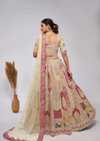 ivory color organza silk fabric paisley motifs embroidered bridal lehenga choli