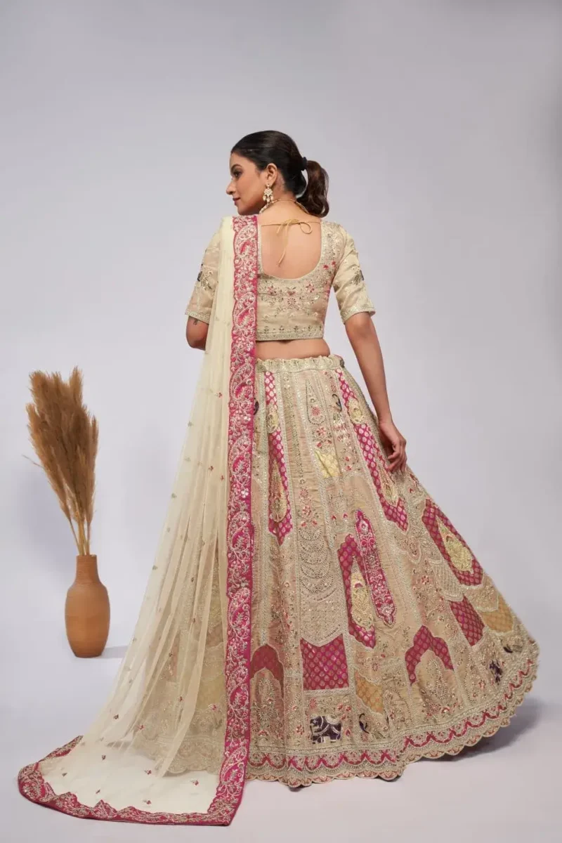 ivory color organza silk fabric paisley motifs embroidered bridal lehenga choli