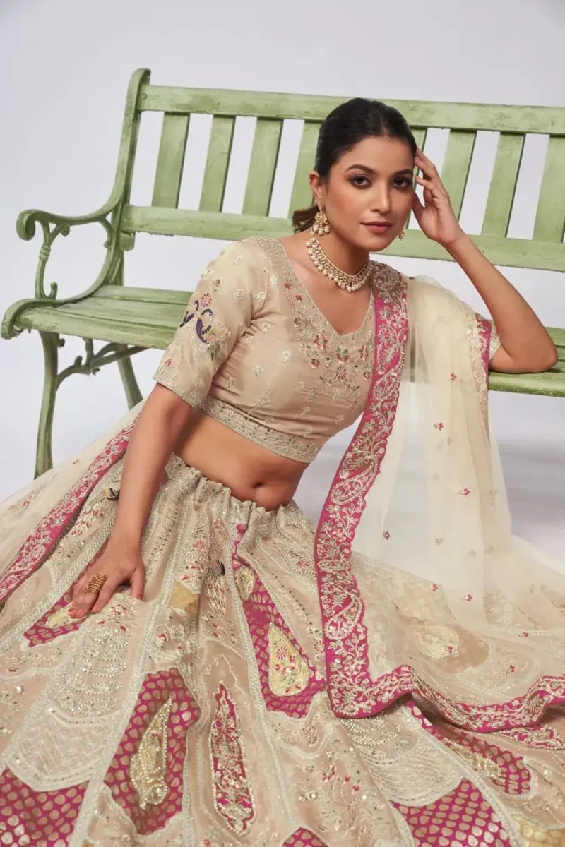 ivory color organza silk fabric paisley motifs embroidered bridal lehenga choli