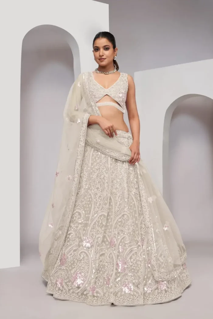 ivory white color imperial paisley and floral patterns sequins embroidered bridal lehenga choli