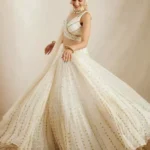 off white color georgette fabric embroidered party wear lehenga choli