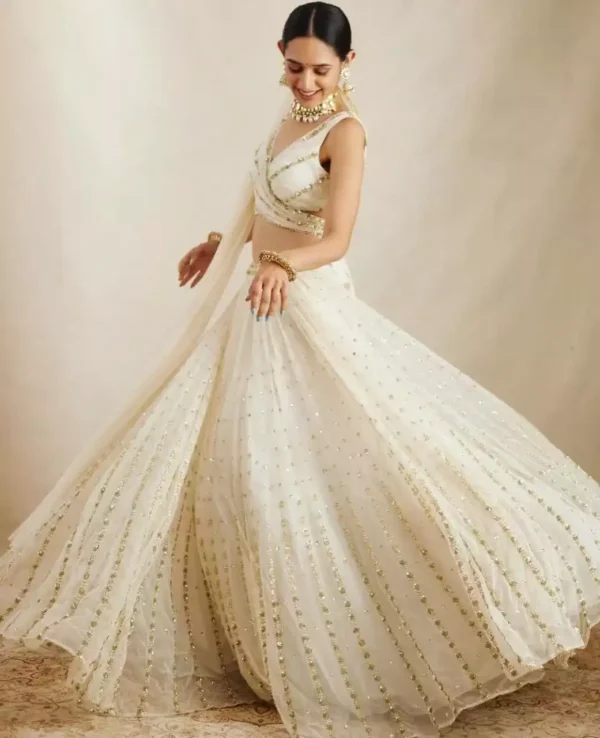 off white color georgette fabric embroidered party wear lehenga choli