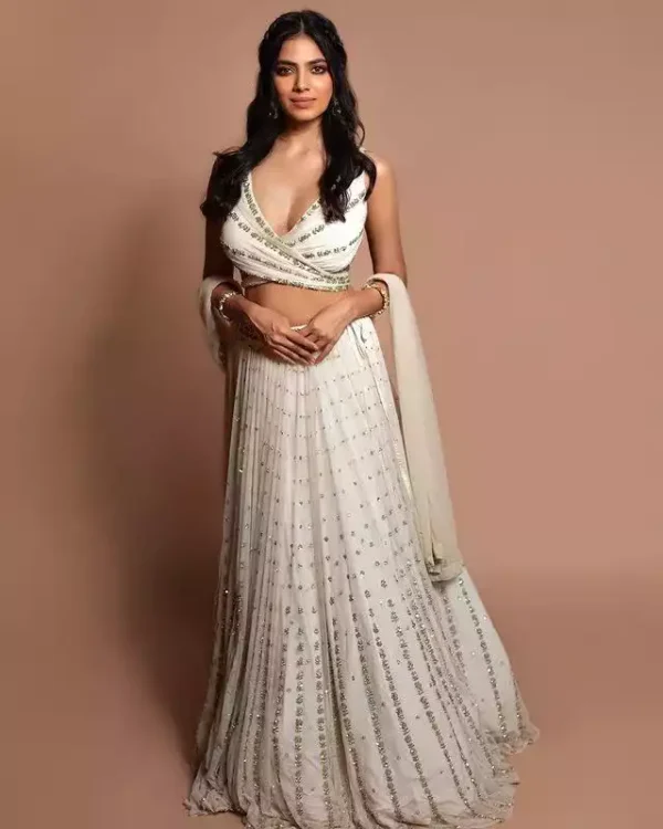 off white color georgette fabric embroidered party wear lehenga choli