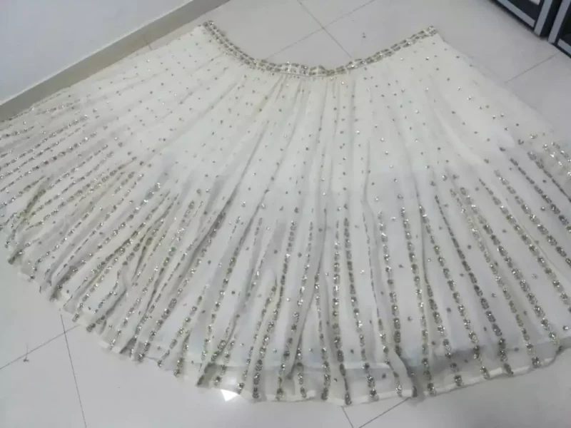off white color georgette fabric embroidered party wear lehenga choli