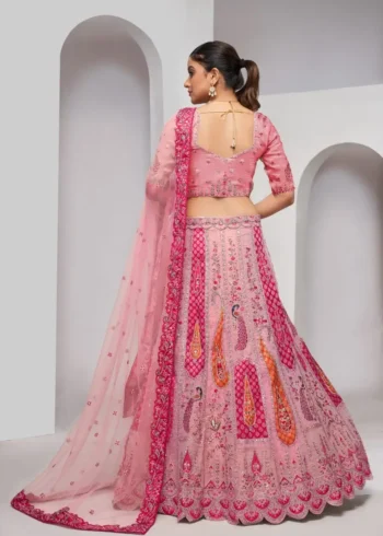 pink color Intricately embroidered paisely motifs surrounded sequins embroidered bridal lehenga choli