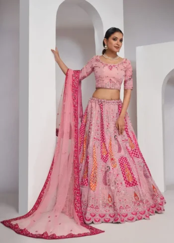 pink color Intricately embroidered paisely motifs surrounded sequins embroidered bridal lehenga choli