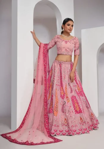 pink color Intricately embroidered paisely motifs surrounded sequins embroidered bridal lehenga choli
