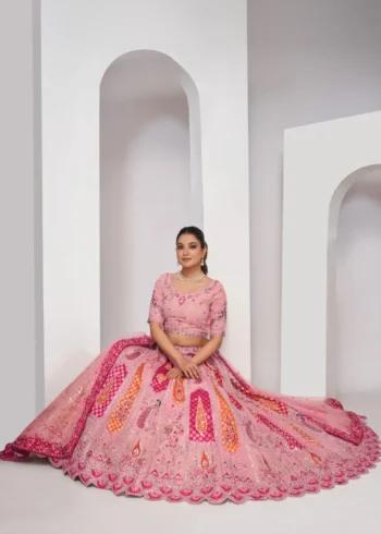 pink color Intricately embroidered paisely motifs surrounded sequins embroidered bridal lehenga choli
