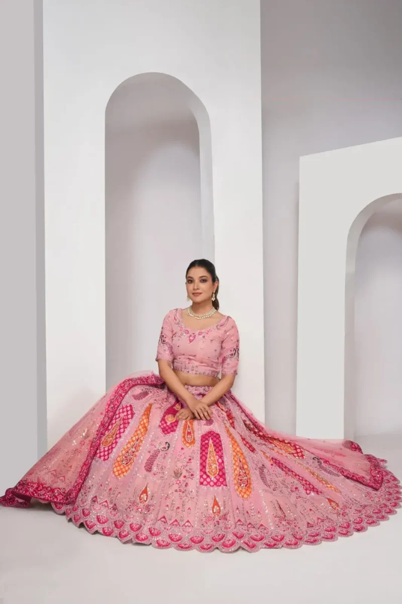 pink color Intricately embroidered paisely motifs surrounded sequins embroidered bridal lehenga choli