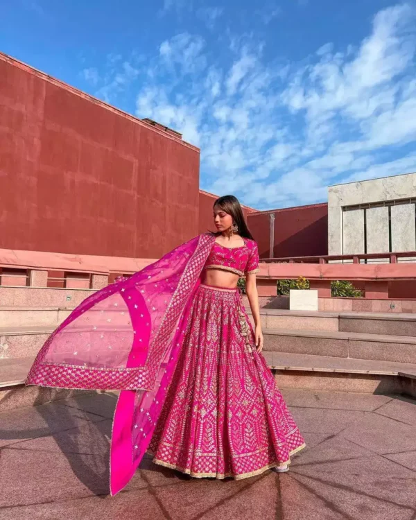 rani color malai satin silk embroidered party wear and bridal lehenga choli