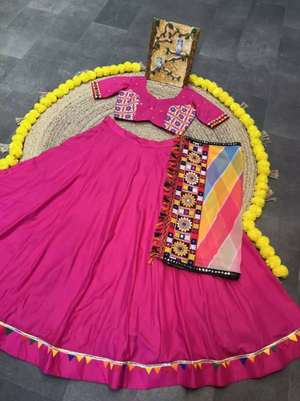 rani color plain navratri chaniya choli with samosa lace work