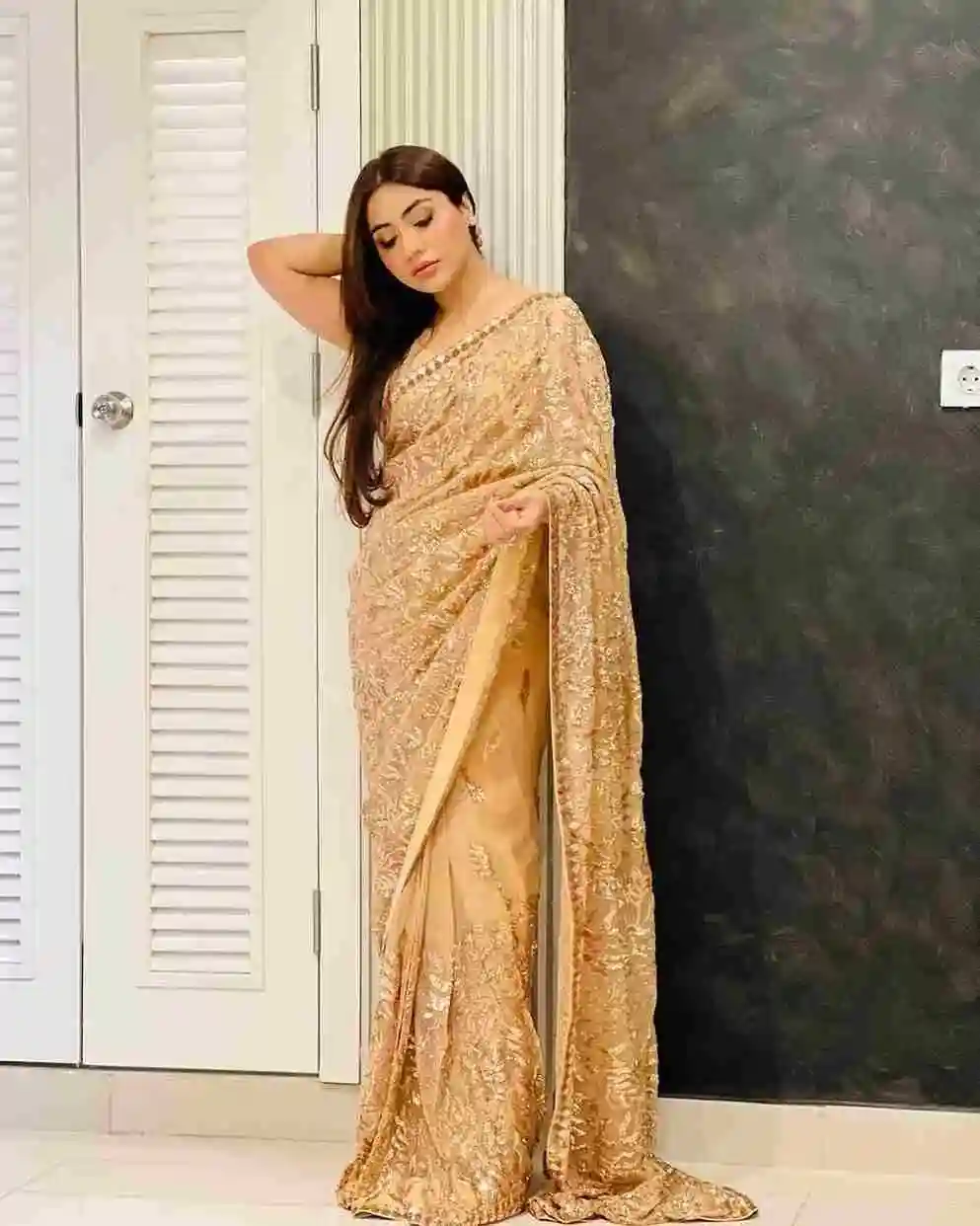 golden color party wear heavy georgette fabric designer saree