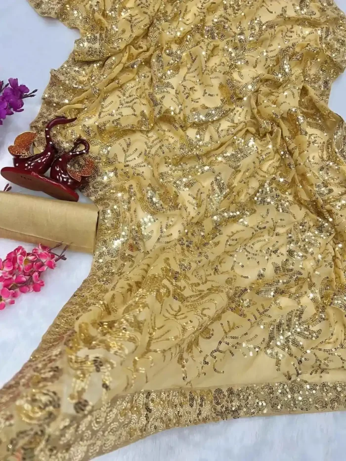 golden color party wear heavy georgette fabric designer saree