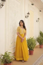 yellow color Heavy Zari Sequins Embroidered Designer Gown