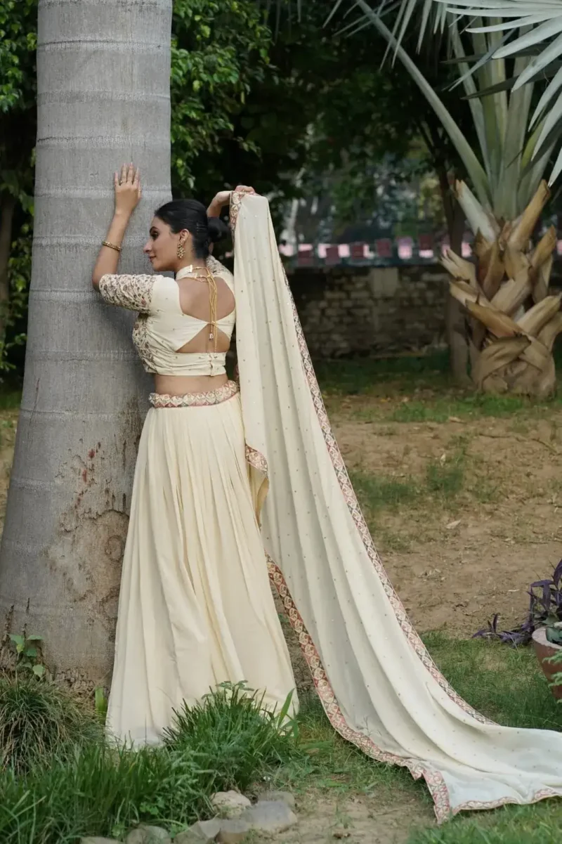 Off White Sequins Thread Embroidered Georgette Lehenga choli