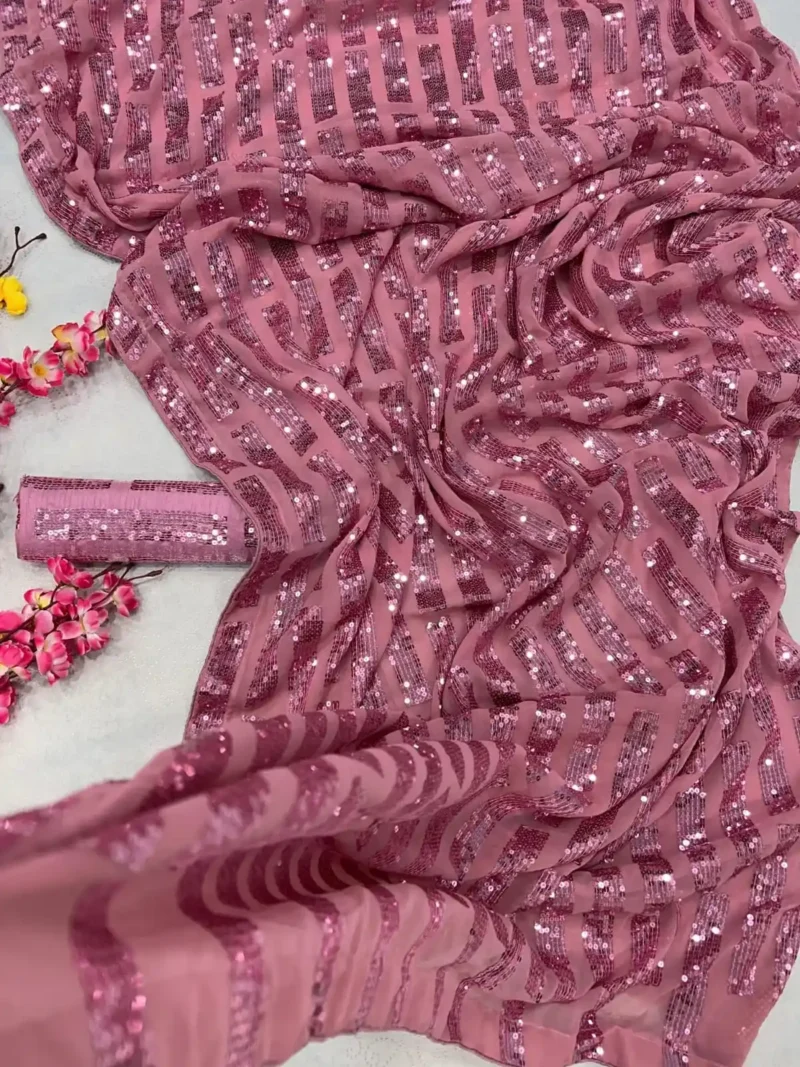 Pink Heavy Georgette Celebrity Inspired Party Wear Saree