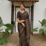 Bold Black Pure Linen Saree With Tassels