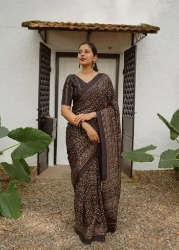 Bold Black Pure Linen Saree With Tassels