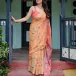 Bright Peach Orange Pure Linen Saree With Tassels
